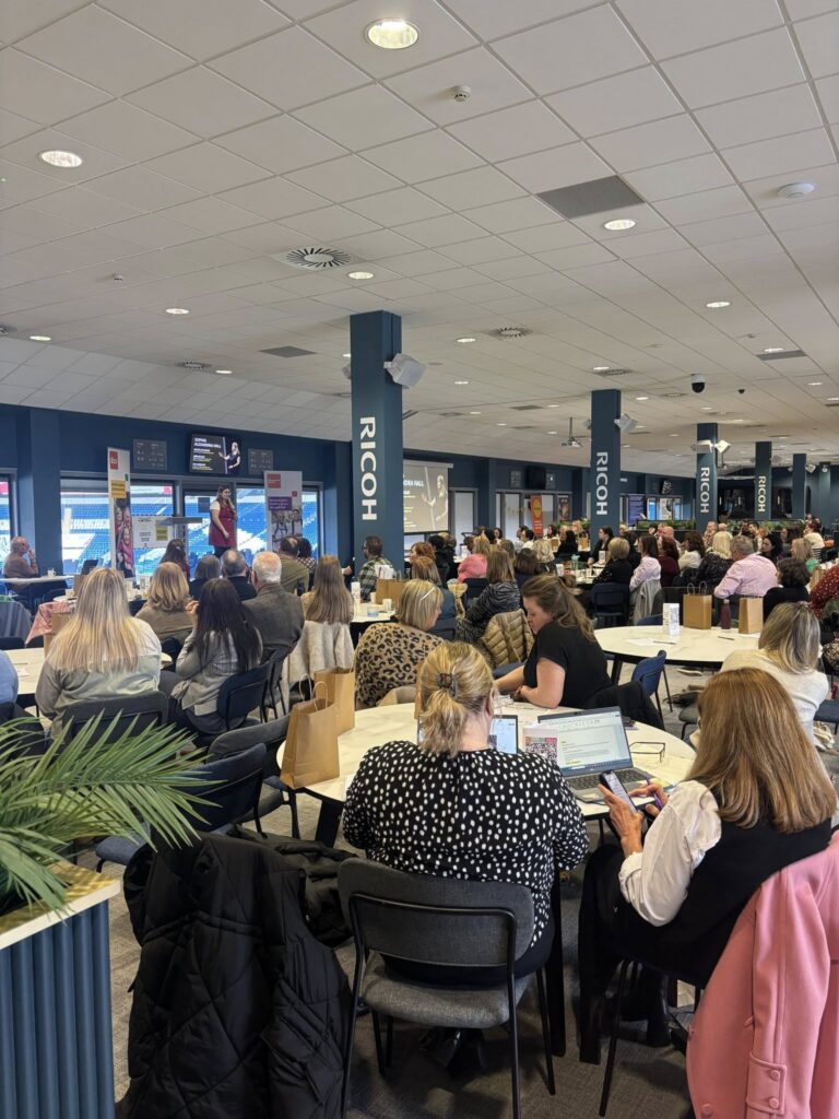Group of foster carers at a conference