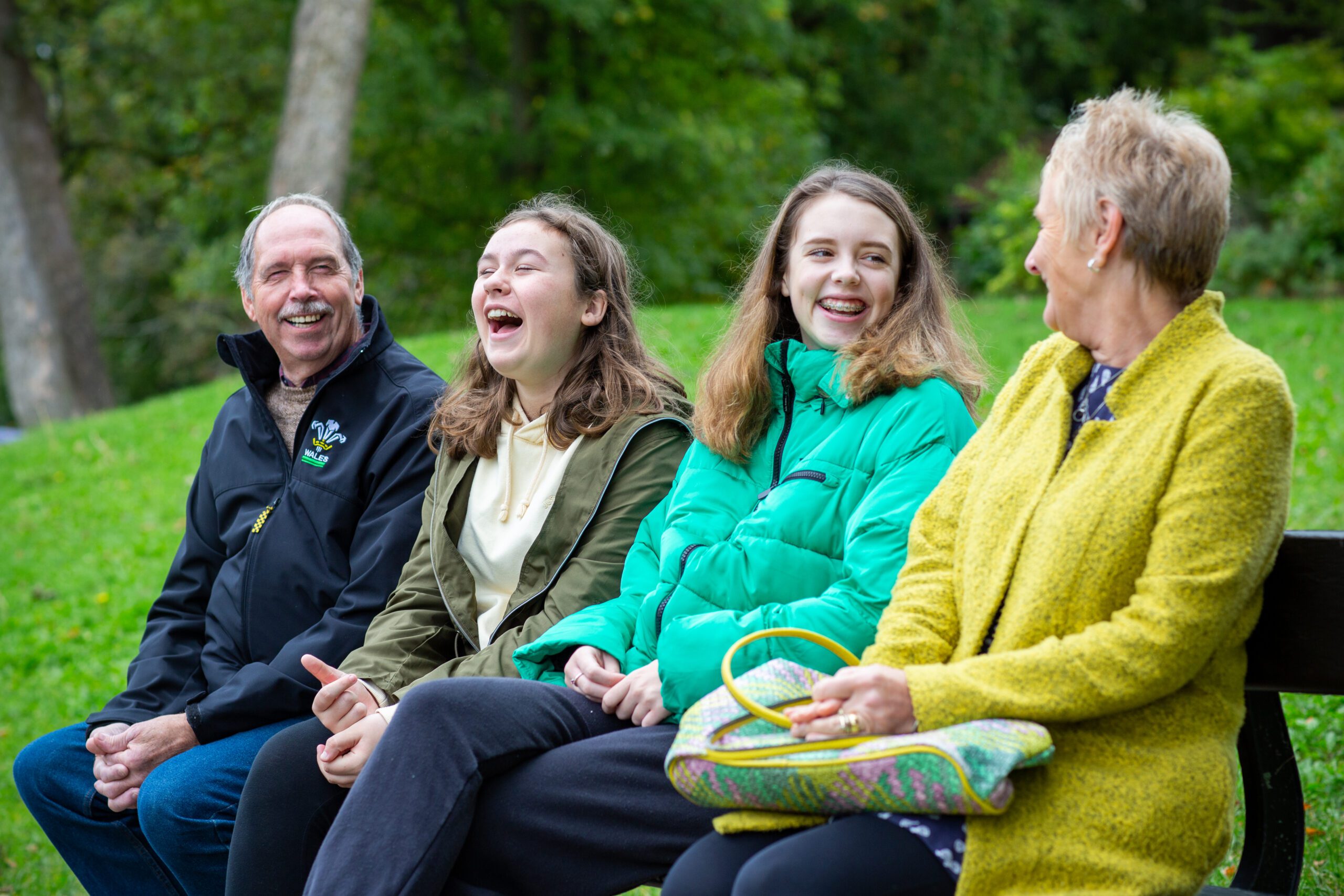 Family on park bench